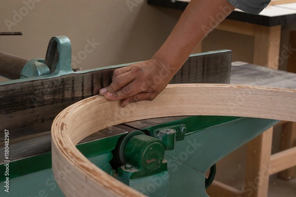 Obraz carpenter - craftsman applying wood bending technique