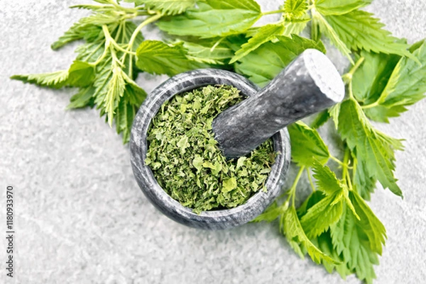 Obraz Nettle dried in mortar on stone top