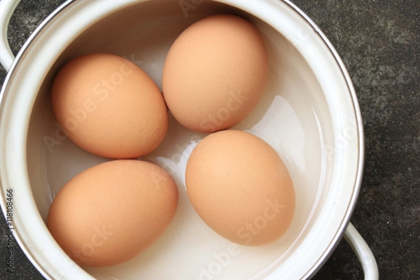 Obraz Eggs boiled in a pot