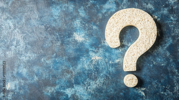 Fototapeta Textured question mark on blue background. Represents basic inquiry and simple question concepts.