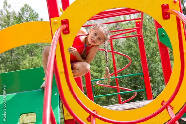 Obraz Portrait preschool caucasian girl playing on the playground