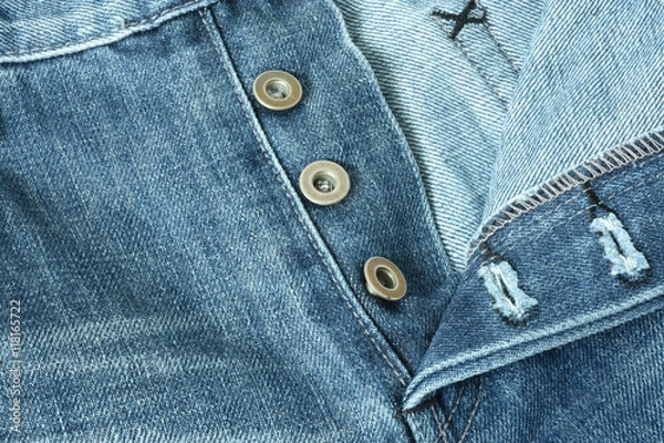 Fototapeta Denim Closeup : texture background of blue jeans.