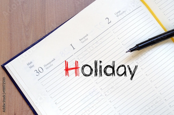 Fototapeta Holiday text concept on notebook