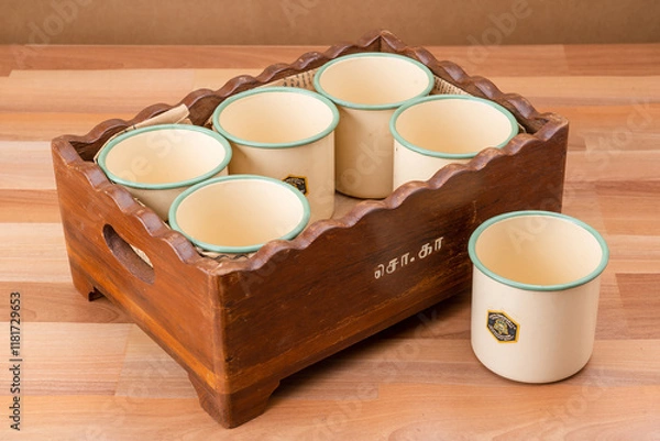 Fototapeta Karaikudi Enamelware cup with Rustic Wooden Box