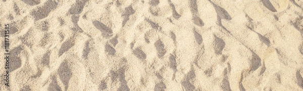 Obraz Summer beach sand background with natural wave pattern. Sand texture. Sunny gold sandy beach.