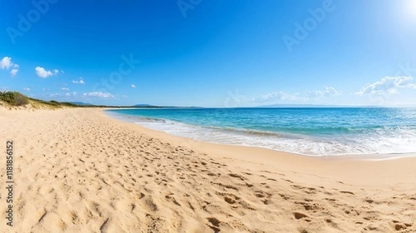 Obraz Footprints leading to the tranquil ocean under a bright sunny sky