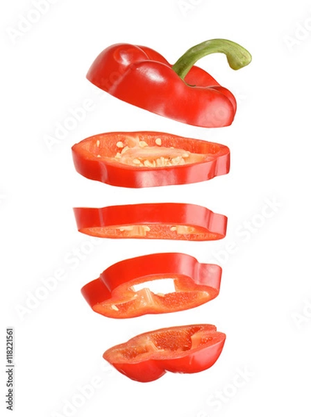 Fototapeta sliced and falling red pepper isolated on white background