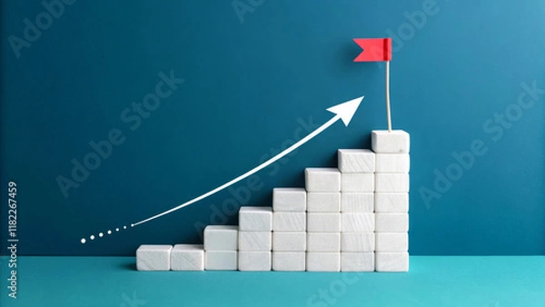 Obraz White blocks are stacked in the form of steps, leading to a small red flag at the top. An upward arrow indicates progress or growth against a teal background.AI