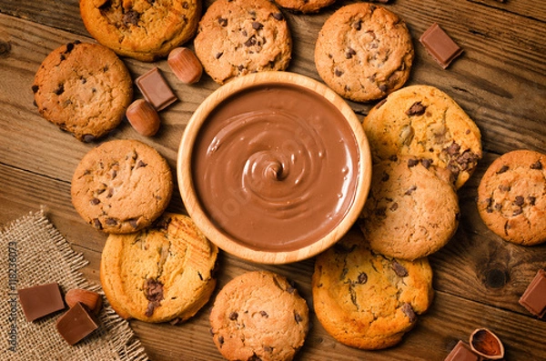 Obraz Melted chocolate, cookies, hazelnut, background