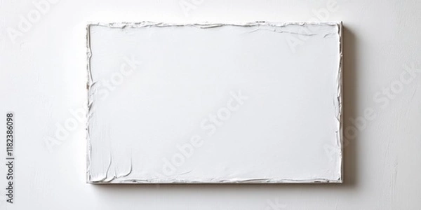 Fototapeta A Blank Canvas is Presented on a Plain White Background for Various Creative Projects