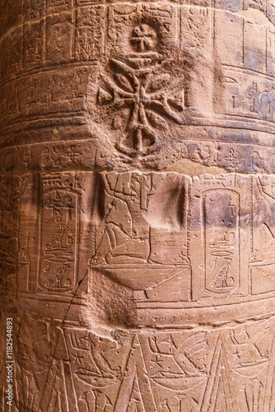 Obraz Agilkia Island, Aswan, Egypt. Christian cross carved over Egyptian hieroglyphics on a column at the Philae Temple, a UNESCO World Heritage Site.