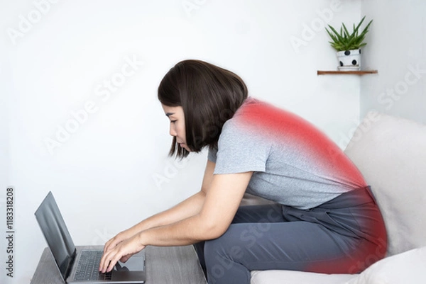 Obraz slouching position concept with Asian woman hunching her back at  computer desk and sitting in bad posture
