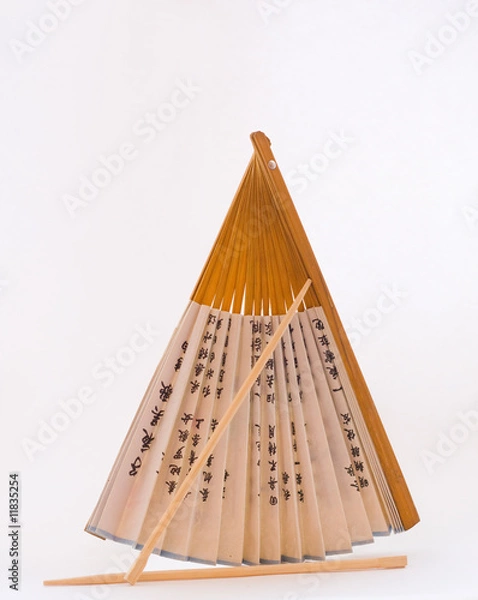 Fototapeta Fan and chopsticks on the white background