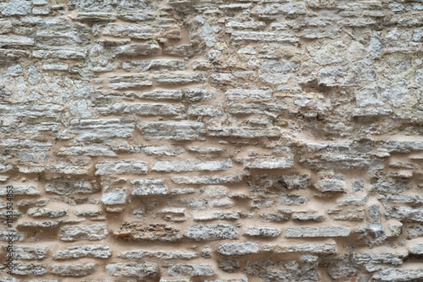 Fototapeta old medieval limestone bricks wall background texture