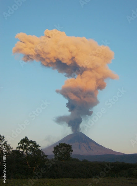 Obraz Karimskiy volcano. Volcanic eruption in Kamchatka, ash flow and destroyed