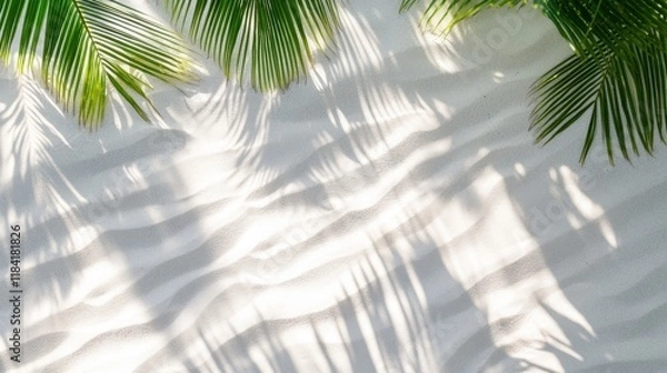 Fototapeta Relaxing summer beach scene with palm leaves casting shadows over warm sand