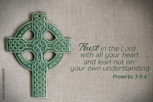 Obraz Cross and proverb on burlap