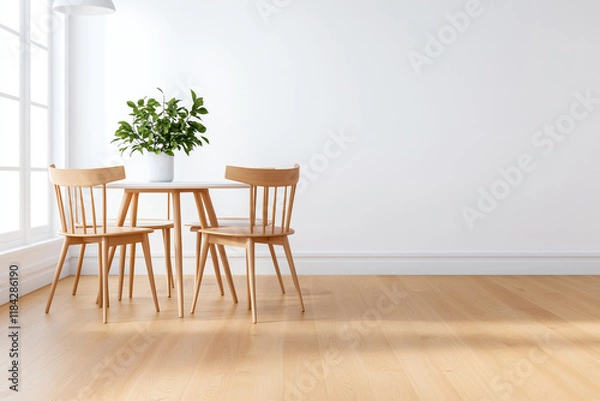 Fototapeta bright and minimalistic white dining room featuring wooden table and chairs, complemented by potted plant. natural light enhances serene atmosphere