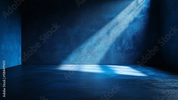 Obraz Light breaks through a dark space creating shadows on the floor