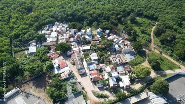 Fototapeta Tiny fisherman's town seen from drone in a poverty suburbs or slumber. 3rd world country very remote location 