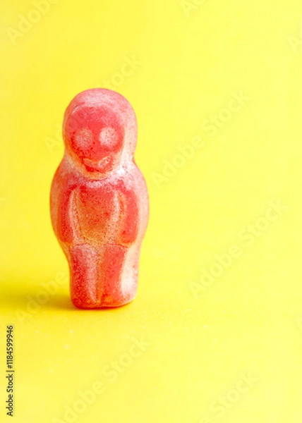 Obraz red candy figure stands alone
