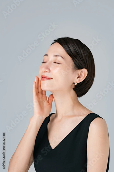 Obraz スキンケアをする女性