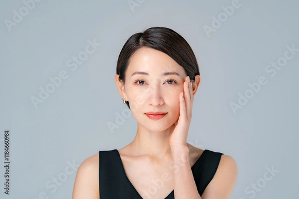 Obraz スキンケアをする女性