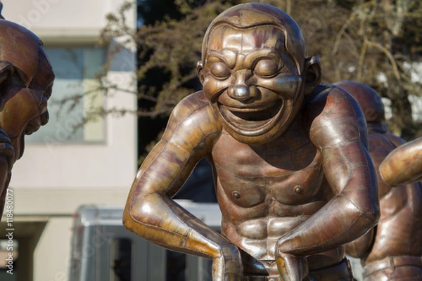 Fototapeta Laughing Man Statues In Vancouver