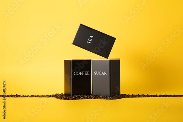 Fototapeta three containers with the words on a yellow background