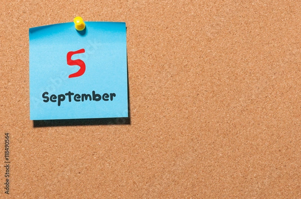 Fototapeta September 5th. Day 5 of month, color sticker calendar on notice board. Autumn time. Empty space for text