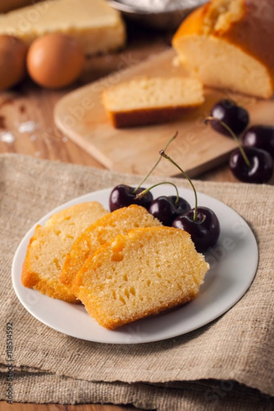 Obraz cut butter cake with cherry