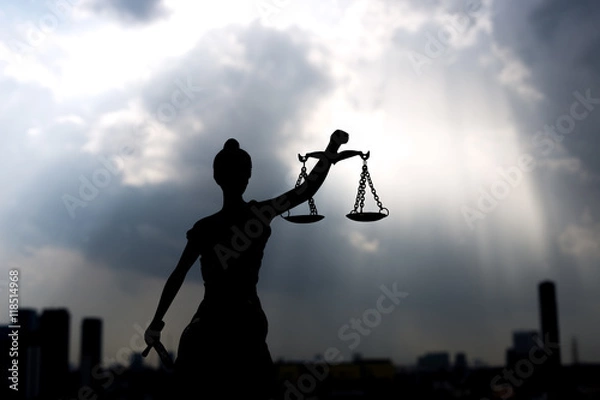Fototapeta Shadow of Lady of Justice and light of God