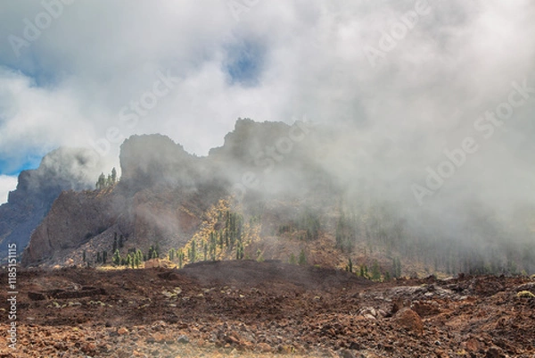Fototapeta Landscape with mountains covered with clouds