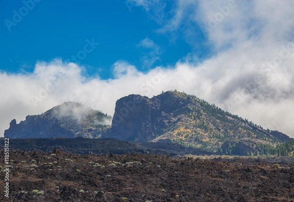 Fototapeta Landscape with mountains covered with clouds