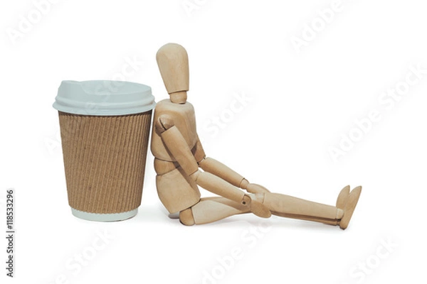 Obraz wooden mannequin  with cup of coffee isolated on white