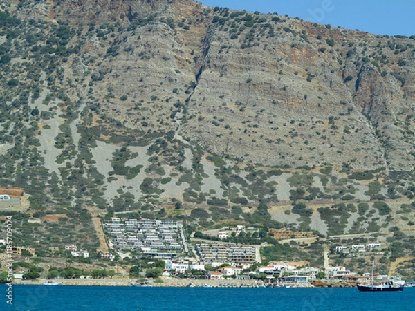 Fototapeta 08.07.2024, Elounda, Crete, Greece: View of the port and city on island of Crete