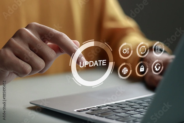 Obraz Software update or operating system upgrade concept. Improved functionality in the new version and improved security. Person using laptop with Software update and upgrade technology.