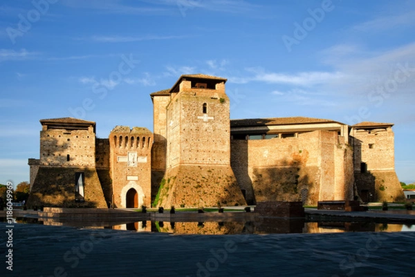 Fototapeta Morning view to castle Sismondo in Rimini, Italy. Part of Fellini Museum. Copy space in sky.