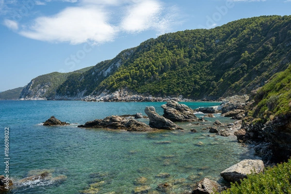 Obraz View of the sea, mountains, rocks, beaches, islands and the sky from different sides of the Skopelos island Greece.