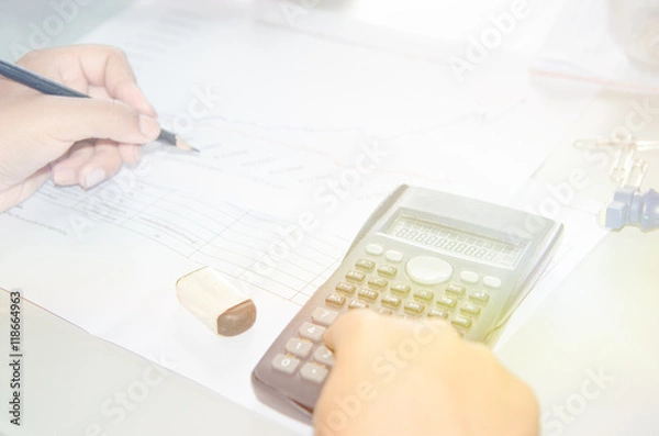 Fototapeta Hands with Calculator and notepad. Hands with Calculator, notepad, business concept.