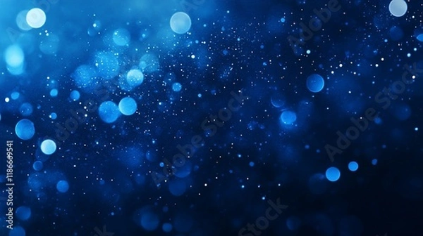 Fototapeta Abstract blue bokeh background with glowing lights and sparkles.