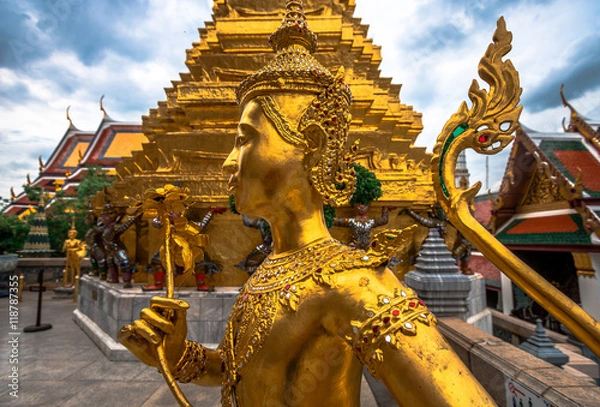 Obraz Golden Angle at Wat Phra Kaeo, Temple of the Emerald Buddha and the home of the Thai King. Wat Phra Kaeo is one of Bangkok's most famous tourist sites and it was built in 1782 at Bangkok, Thailand.