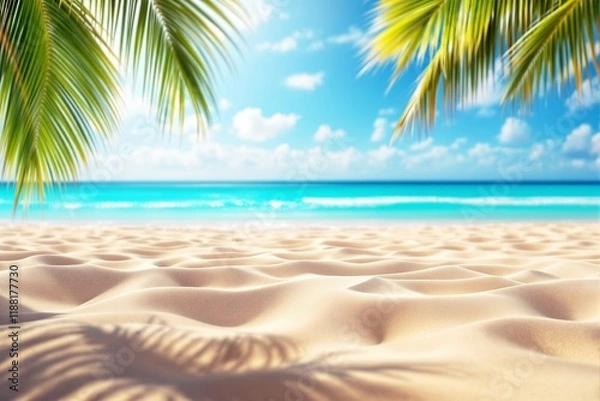 Fototapeta Serene tropical beach with golden sand, turquoise waters, and palm tree fronds under a bright blue sky.