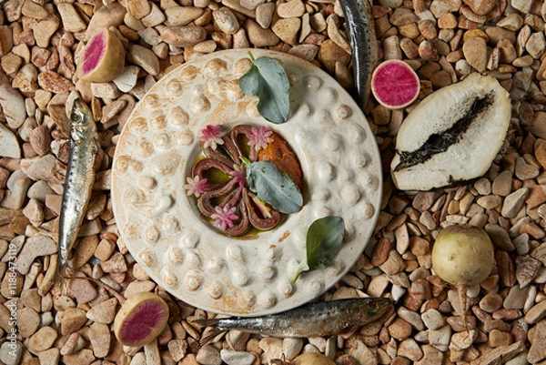 Fototapeta Horse mackerel fillet with radish and spinach in sauce