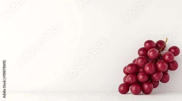 Fototapeta A Luscious Bunch of Bright Red Grapes on a Clean White Background
