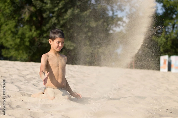 Obraz a boy plays on the beach