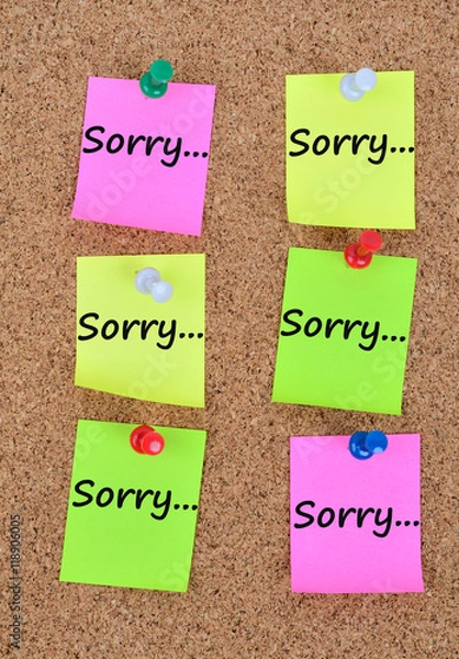 Fototapeta The word Sorry on notes