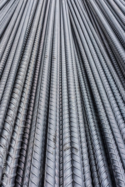 Fototapeta Pile of deformed  reinforcing bars. They are reinforcement steel materials in reinforced masonry structures.