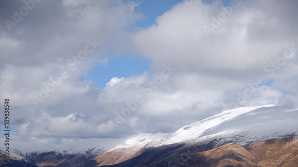 Obraz Midzor summit, Highest peak on Stara planina (Balkan mountains), covered by snow under a cloudy sky