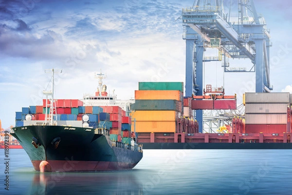 Fototapeta Container Cargo ship with working crane bridge in seaport for lo